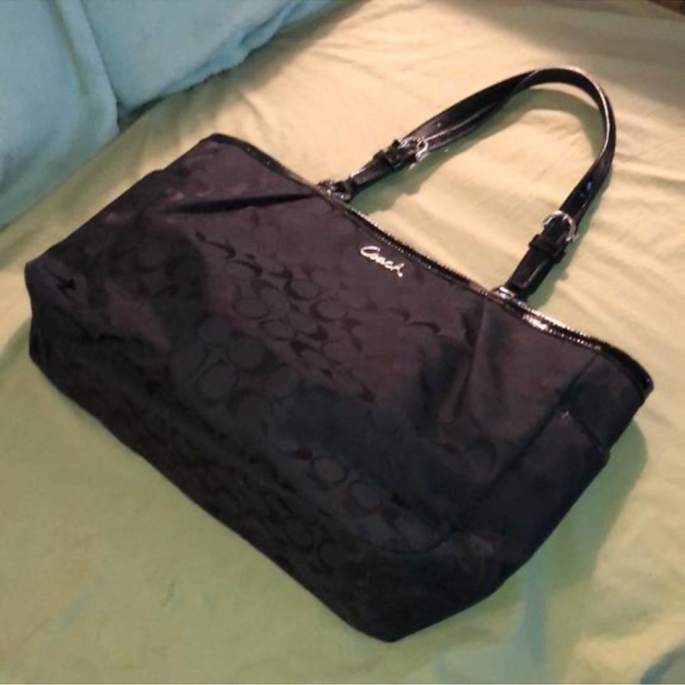 Authentic Coach tote with black iconic logos and black leather trim. - Picture 10 of 13